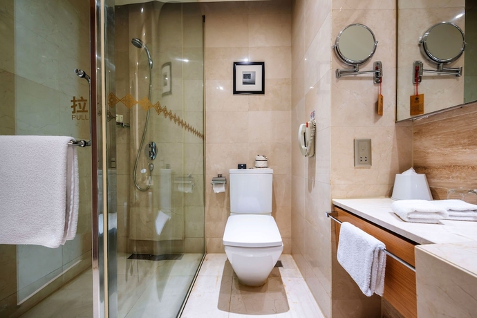 Imagen de la habitación del Hotel Jinling Wuxi. Foto 5
