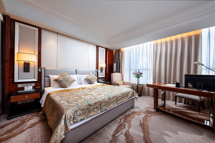 Imagen de la habitación del Hotel Jinling Wuxi. Foto 6