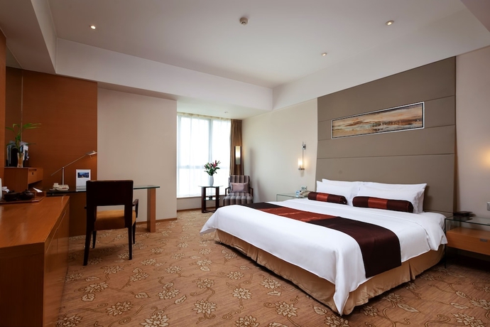 Imagen de la habitación del Hotel Jinling Wuxi. Foto 8