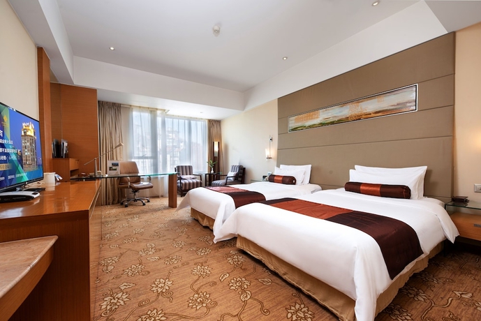 Imagen de la habitación del Hotel Jinling Wuxi. Foto 9