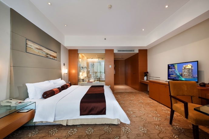 Imagen de la habitación del Hotel Jinling Wuxi. Foto 11