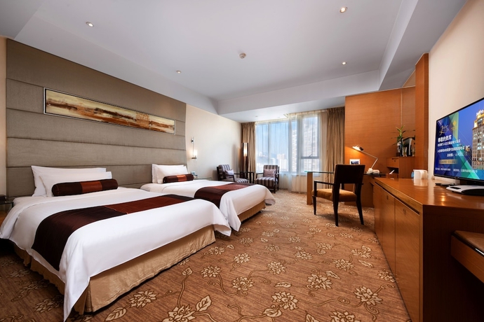 Imagen de la habitación del Hotel Jinling Wuxi. Foto 12