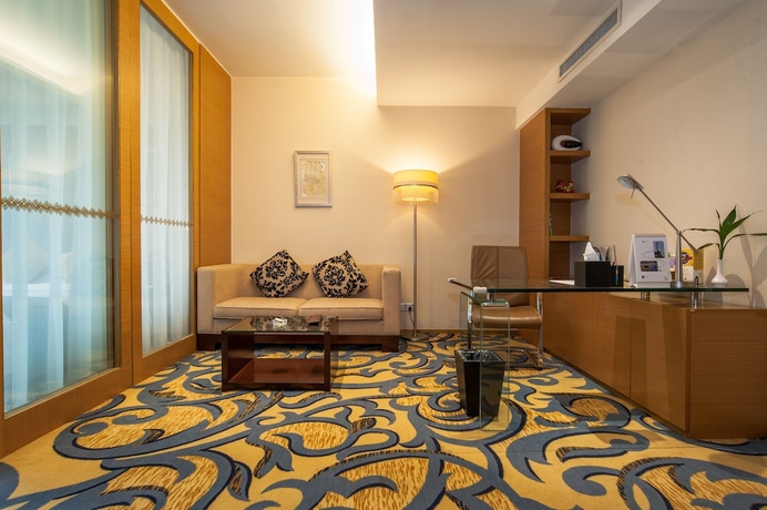 Imagen de la habitación del Hotel Jinling Wuxi. Foto 15