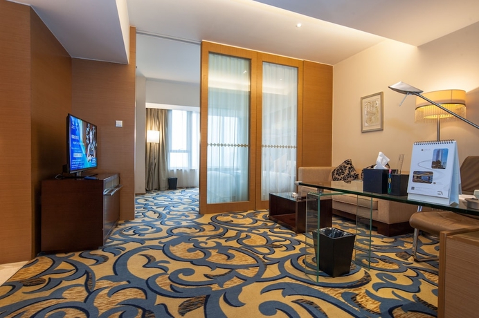 Imagen de la habitación del Hotel Jinling Wuxi. Foto 16