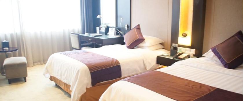 Imagen de la habitación del Hotel Jinling Yangzhou. Foto 2