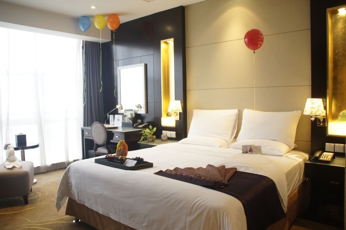 Imagen de la habitación del Hotel Jinling Yangzhou. Foto 3