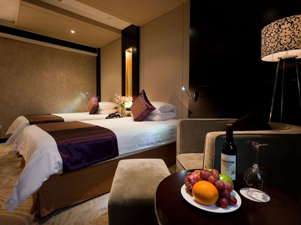 Imagen de la habitación del Hotel Jinling Yangzhou. Foto 5