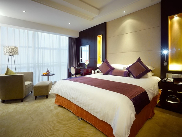 Imagen de la habitación del Hotel Jinling Yangzhou. Foto 6