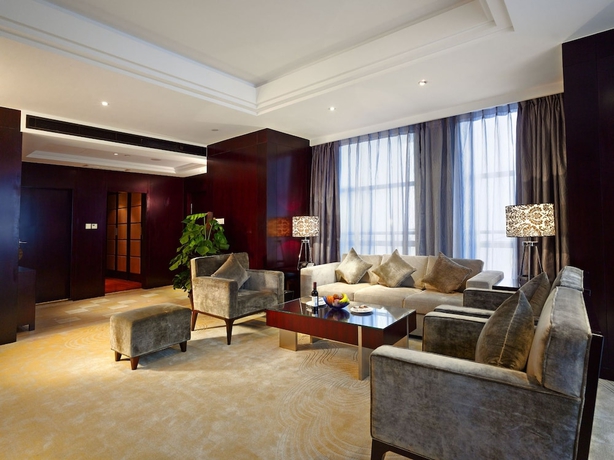 Imagen de la habitación del Hotel Jinling Yangzhou. Foto 11