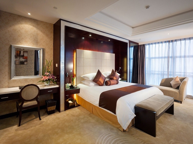 Imagen de la habitación del Hotel Jinling Yangzhou. Foto 15