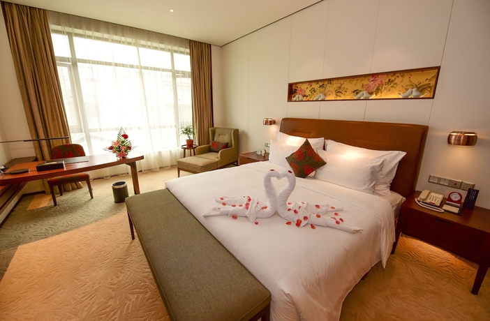 Imagen de la habitación del Hotel Jinling Yew Resort Wuxi. Foto 8