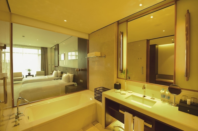 Imagen de la habitación del Hotel Jinling Yew Resort Wuxi. Foto 9