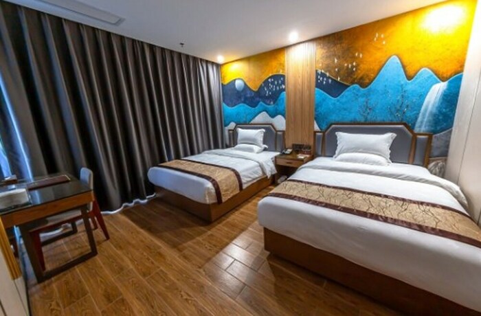 Imagen de la habitación del Hotel Jinlong Chaozhou. Foto 11