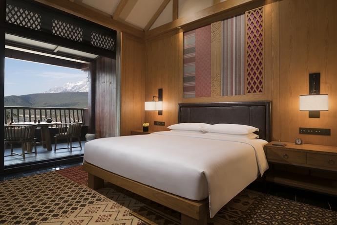 Imagen de la habitación del Hotel Jinmao Purelax Mountain Lijiang. Foto 7