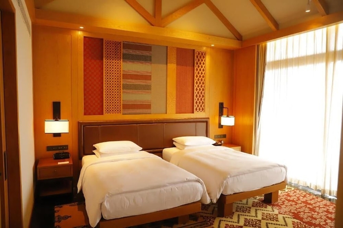 Imagen de la habitación del Hotel Jinmao Purelax Mountain Lijiang. Foto 11