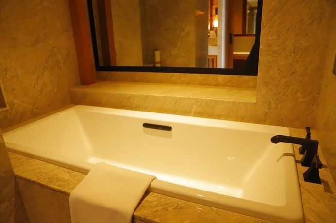 Imagen de la habitación del Hotel Jinmao Purelax Mountain Lijiang. Foto 15
