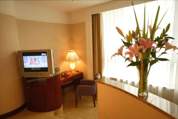 Imagen de la habitación del Hotel Jinrong International. Foto 7