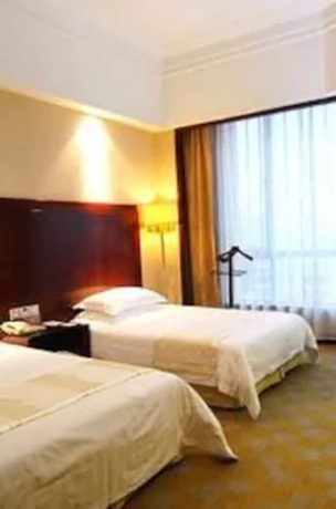 Imagen de la habitación del Hotel Jinrong International. Foto 9