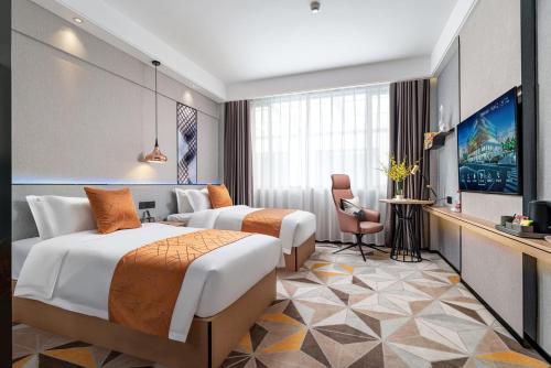 Imagen de la habitación del Hotel Jinshi. Foto 19