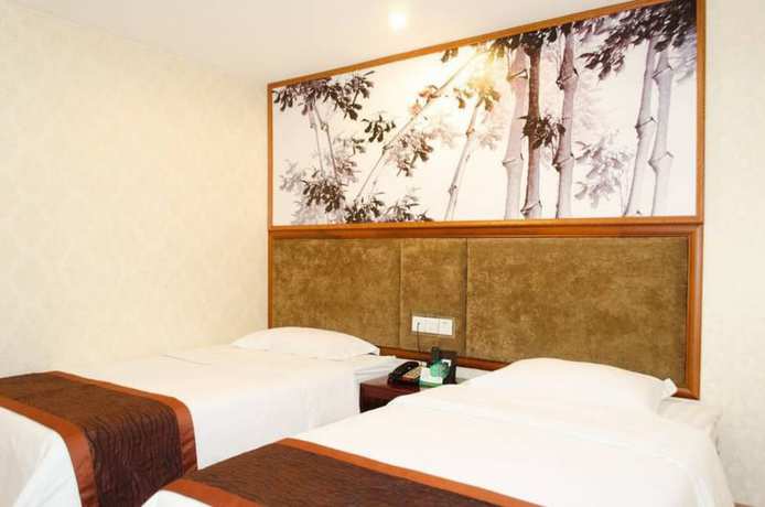 Imagen de la habitación del Hotel Jintang Guangzhou. Foto 17