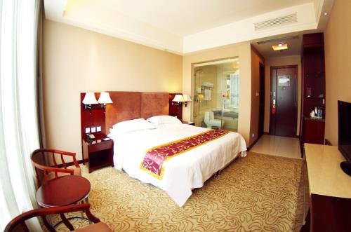 Imagen de la habitación del Hotel Jinziyin Business. Foto 4