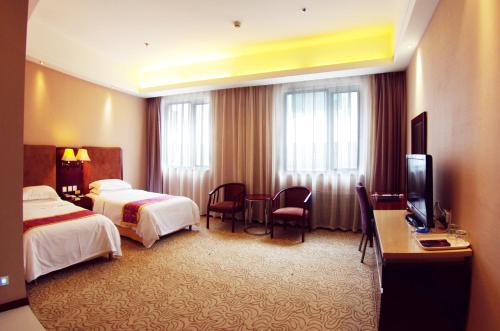 Imagen de la habitación del Hotel Jinziyin Business. Foto 6