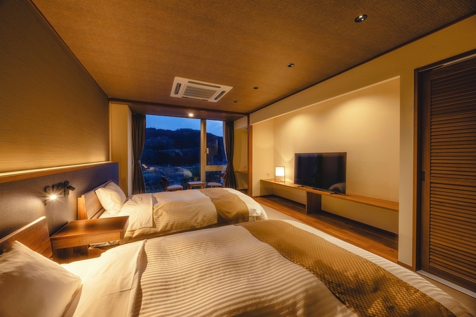 Imagen de la habitación del Hotel Jinzukyo Kasuga Onsen Tominowa. Foto 13