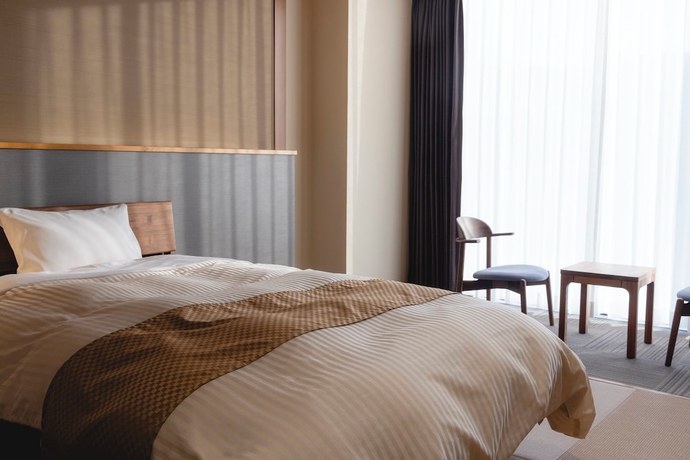 Imagen de la habitación del Hotel Jinzukyo Kasuga Onsen Tominowa. Foto 14