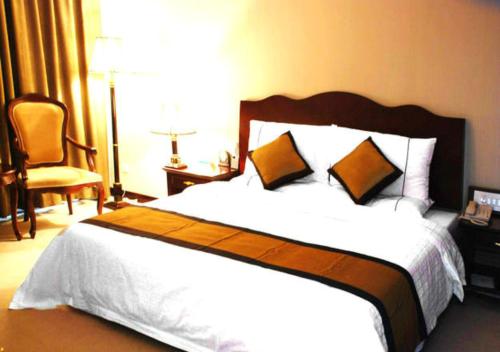 Imagen de la habitación del Hotel Jiu Quan Oriental International. Foto 5