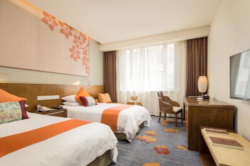 Imagen de la habitación del Hotel Jiuhua Mountain Julong. Foto 9