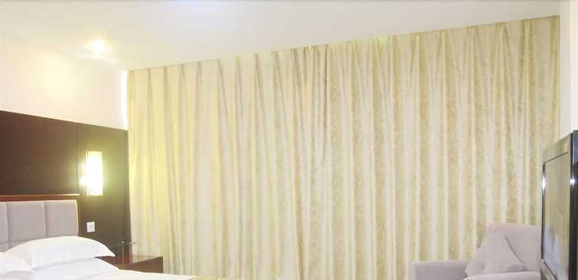 Imagen de la habitación del Hotel Jiuhuashan Center. Foto 8