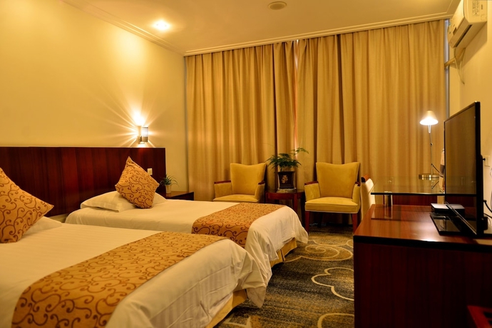 Imagen de la habitación del Hotel Jiuhuashan Center. Foto 2