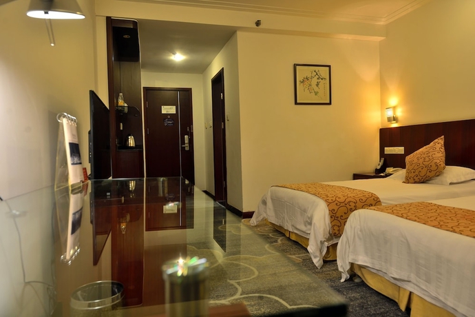 Imagen de la habitación del Hotel Jiuhuashan Center. Foto 3