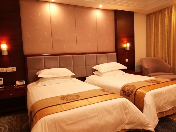 Imagen de la habitación del Hotel Jiuhuashan Center. Foto 9