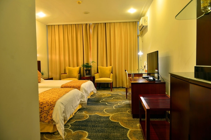 Imagen de la habitación del Hotel Jiuhuashan Center. Foto 11