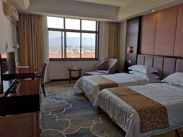 Imagen de la habitación del Hotel Jiuhuashan Center. Foto 15