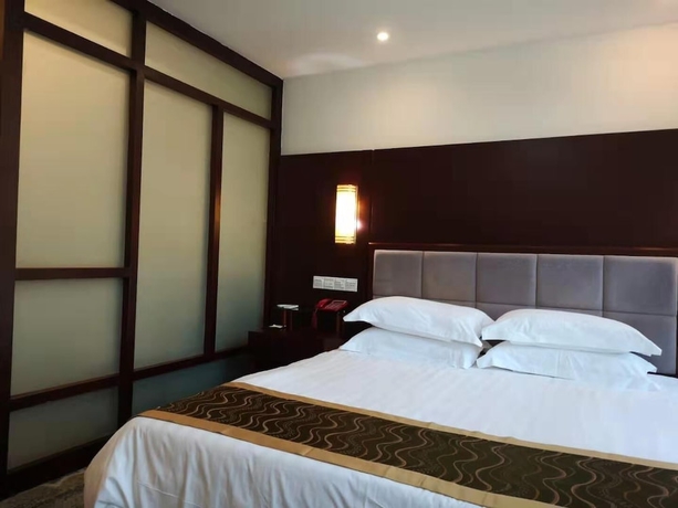 Imagen de la habitación del Hotel Jiuhuashan Center. Foto 18