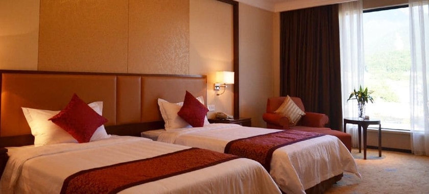 Imagen de la habitación del Hotel Jiuhuashan Ocean Line. Foto 15