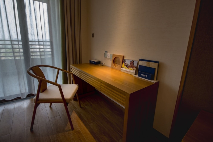 Imagen de la habitación del Hotel Jiuhuashan Rongxi Manor Hot Spring. Foto 6