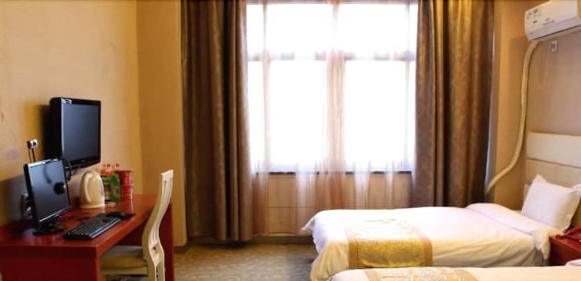 Imagen de la habitación del Hotel Jiujiang Bonnie Express Business Hotel. Foto 6