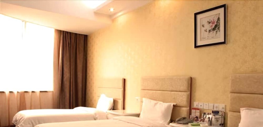 Imagen de la habitación del Hotel Jiujiang Bonnie Express Business Hotel. Foto 7