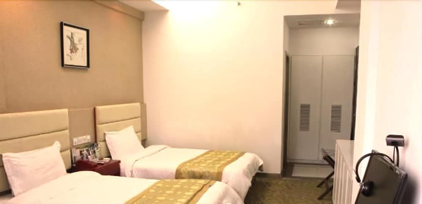 Imagen de la habitación del Hotel Jiujiang Bonnie Express Business Hotel. Foto 8