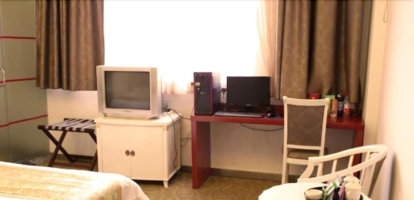Imagen de la habitación del Hotel Jiujiang Bonnie Express Business Hotel. Foto 9