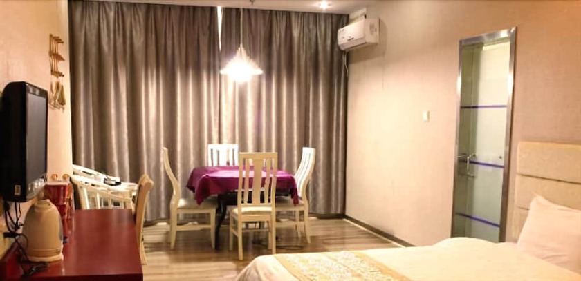 Imagen de la habitación del Hotel Jiujiang Bonnie Express Business Hotel. Foto 10