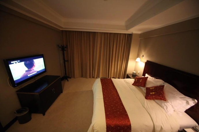 Imagen de la habitación del Hotel Jiujiang Sandn International. Foto 7