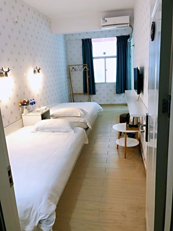Imagen de la habitación del Hotel Jiulongwan Boutique Apartment. Foto 2