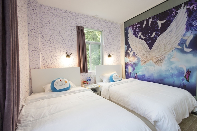 Imagen de la habitación del Hotel Jiulongwan Boutique Apartment. Foto 3