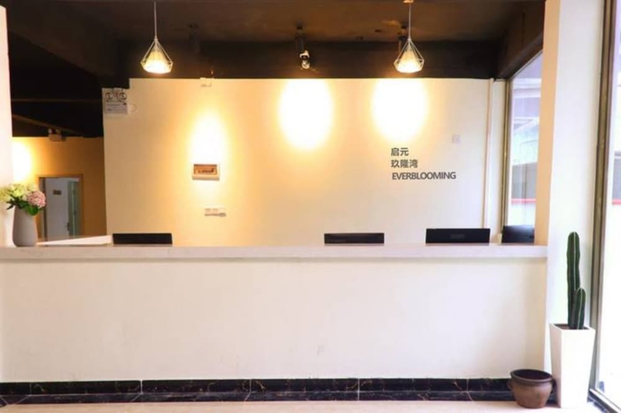 Imagen de los interiores del Hotel Jiulongwan Boutique Apartment. Foto 19
