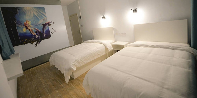 Imagen de la habitación del Hotel Jiulongwan Boutique Apartment. Foto 6