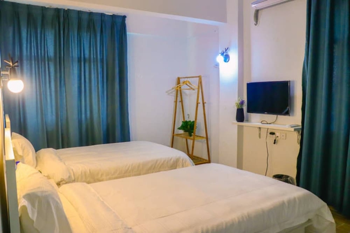 Imagen de la habitación del Hotel Jiulongwan Boutique Apartment. Foto 7
